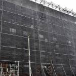 DAN HAMMOCK | GRAYS HARBOR NEWS GROUP                                 The scaffolding and sheeting hiding the brick exterior of Emerson Manor in Hoquiam started coming down Feb. 5 as a major renovation project reaches its conclusion.