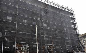 DAN HAMMOCK | GRAYS HARBOR NEWS GROUP                                 The scaffolding and sheeting hiding the brick exterior of Emerson Manor in Hoquiam started coming down Feb. 5 as a major renovation project reaches its conclusion.