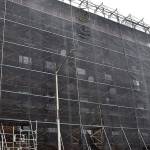 DAN HAMMOCK | GRAYS HARBOR NEWS GROUP                                 The scaffolding and sheeting hiding the brick exterior of Emerson Manor in Hoquiam started coming down Feb. 5 as a major renovation project reaches its conclusion.