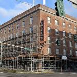 DAN HAMMOCK | GRAYS HARBOR NEWS GROUP                                 The scaffolding thats covered up the historic Hoquiam Emerson Manor as improvements were made to the brick structure was almost completely gone Sunday afternoon.