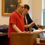 Edward Lugo reads a letter to the judge during his sentencing on Friday morning as his lawyer David Hatch stands by. (Thorin Sprandel | Grays Harbor News Group)