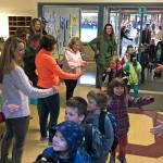 Courtesy photo                                The community and parents formed a Kindness Tunnel Feb. 3 to welcome students to Cosmopolis School with high fives, smiles, kind words and encouragement.