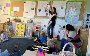 COURTESY LEARNING TO GROW                                 Kourtnie Mueller is leading a literacy activity in Learning to Grows pre-kindergarten class. The class is a creative blend of private pay child care, Working Connections state subsidy care and ECEAP state-assisted preschool.