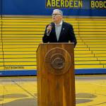 Gov. Jay Inslee during his speech to Aberdeen High School students in the gym on Wednesday. (Thorin Sprandel | Grays Harbor News Group)