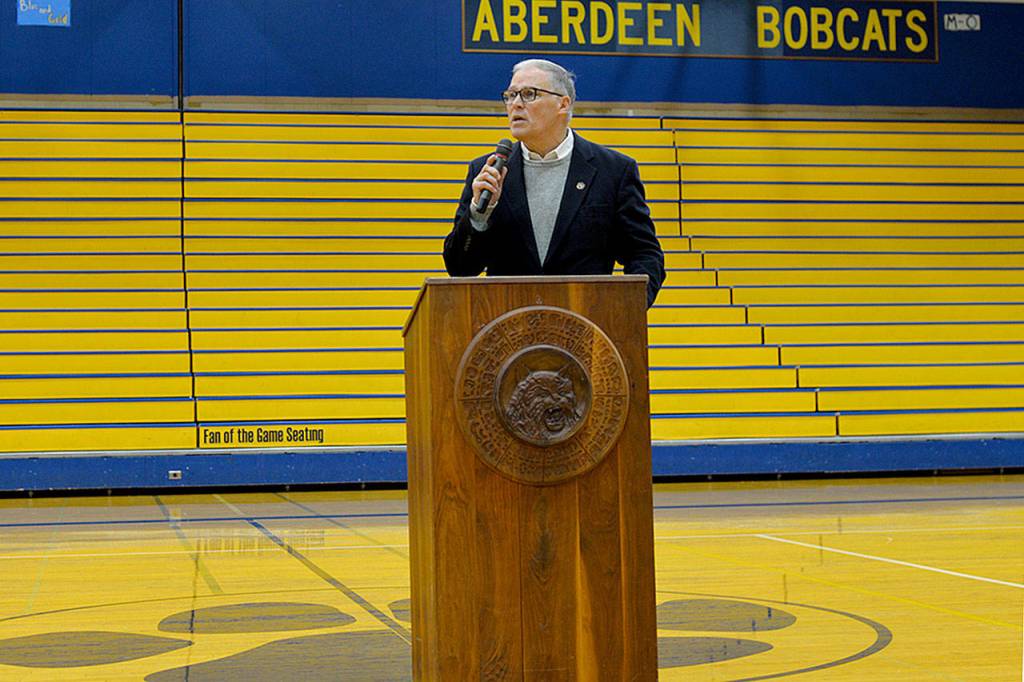 Gov. Jay Inslee during his speech to Aberdeen High School students in the gym on Wednesday. (Thorin Sprandel | Grays Harbor News Group)