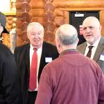 DAN HAMMOCK | GRAYS HARBOR NEWS GROUP                                 Port of Grays Harbor Commissioners Stan Pinnick, left, and Phil Papac chat with guests at the Ports annual business report breakfast at the Rotary Log Pavilion in Aberdeen Wednesday.