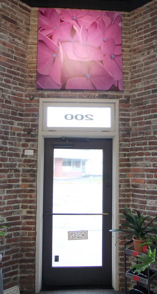 An oil painting hangs above the door Jan. 29 at the Moore Gallery in Montesano. (Michael Lang | Grays Harbor News Group.)