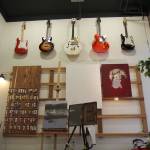Guitars hang above Trina Moores painting area Jan. 29, 2020, at the Moore Gallery in Montesano. (Michael Lang | Grays Harbor News Group)