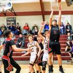 Ocostas Cole Hatton (11), seen here against South Bend on Feb. 4, was one of three Pacific County standouts named to the 2B Pacific Leagues First Team. (Photo by Larry Bale)