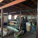 Stacks upon stacks of wood pieces are still crammed into the old ballroom from decades past.