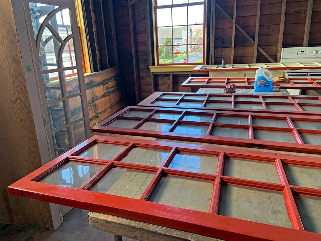 The original French doors from the second-story residence have been removed and repainted, and owner Ginger Mounts plans to build a balcony out there.