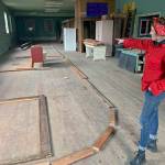 Photos by Kat Bryant | Grays Harbor News Group                                Owner Ginger Mounts indicates the areas being framed for four bedrooms along the north side of the first floor.