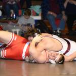Montesanos Kenny Koonrad works to secure the fall over Castle Rocks Jonah McGary during Saturdays regional meet at Hoquiam High School. Koonrad won the 285-pound title to help the Bulldogs to a team regional championship. (Photo by Sue Michalak Budsberg)