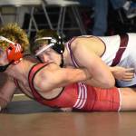 Prep Wrestling Roundup: Five Montesano wrestlers win to lead Bulldogs to regional championship