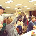 Ken Scheuer of Hoquiam, a member of Push Rods for three years, served as one of the auction spotters and money-gatherers Sunday.