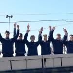 Members of the Aberdeen High School Boys Swimming team pose on the back of an Army National Guard truck during a state tournament sendoff ceremony on Thursday. They will compete in this weekends state 2A championship meet at the King County Aquatic Center in Federal Way. (Thorin Sprandel | Grays Harbor News Group)
