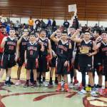 The Taholah Chitwhins were all smiles on Thursday after defeating Naselle 58-53 to win the 1B District 4 Tournament at Montesano High School. (Ryan Sparks | Grays Harbor News Group)