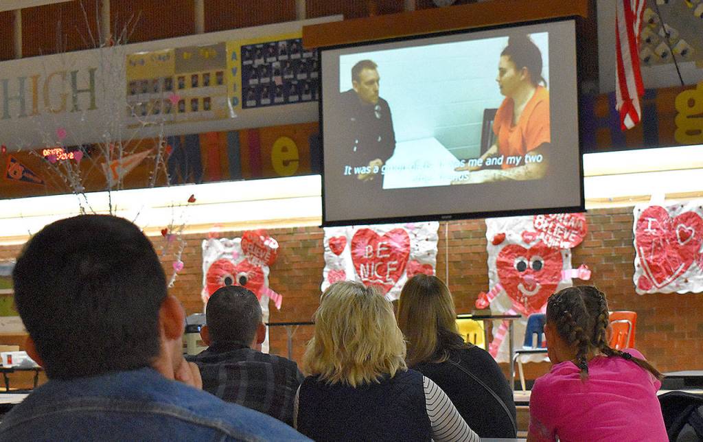 DAN HAMMOCK | GRAYS HARBOR NEWS GROUP                                 Miller Junior High parents and students watch Aberdeen Police Officer Loren Neils video, The Dangers of Drug Usage, Thursday evening. The video is part of the school districts multi-pronged drug prevention program.