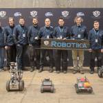 Team Robotika  from universities and businesses in the Czech Republic, Switzerland and the United States  poses for a photo recently at the DARPA Subterranean Challenge Urban Circuit competition at the Satsop Business Park in Grays Harbor County. (Photo courtesy Defense Advanced Research Projects Agency)