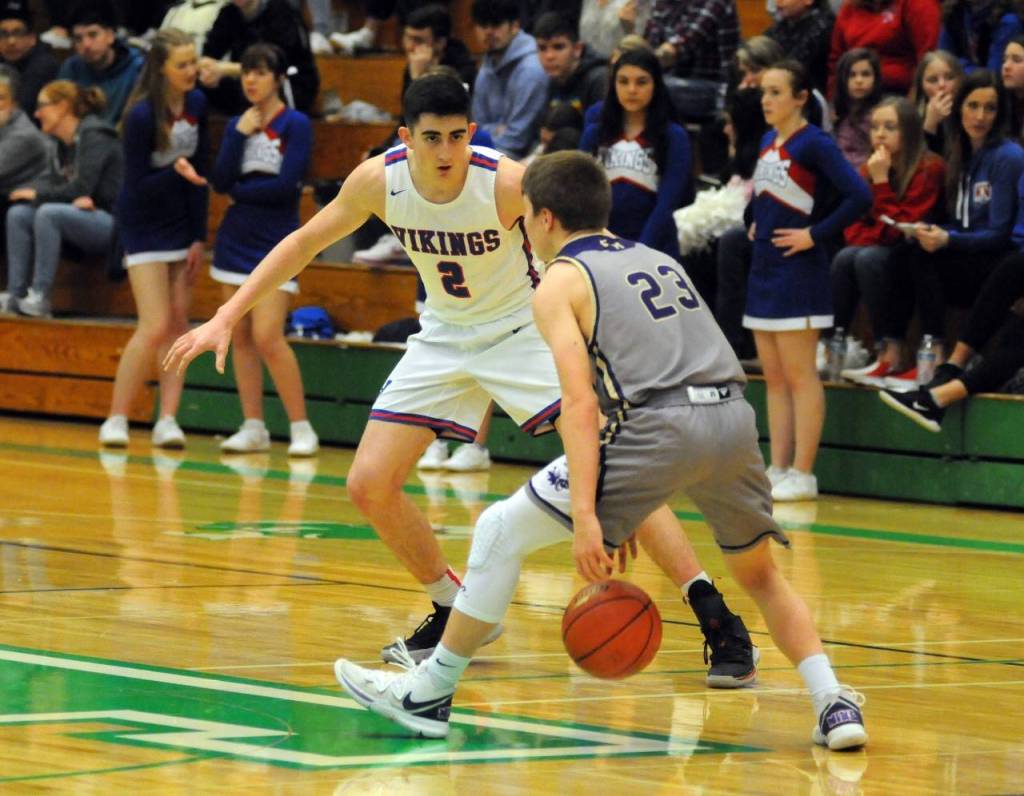 Willapa Valleys Logan Walker (2) defends against Friday Harbors Dylan Roberson in Saturdays regional game at Tumwater High School. (Ryan Sparks | Grays Harbor News Group)