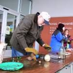 Dr. Curtis Ebbesmeyer, left, will once again examine Trash and Treasure found on local beaches as part of the 33rd annual Beachcombers Fun Fair at the Ocean Shores Convention Center this Saturday and Sunday. (Photo by Scott D. Johnston)
