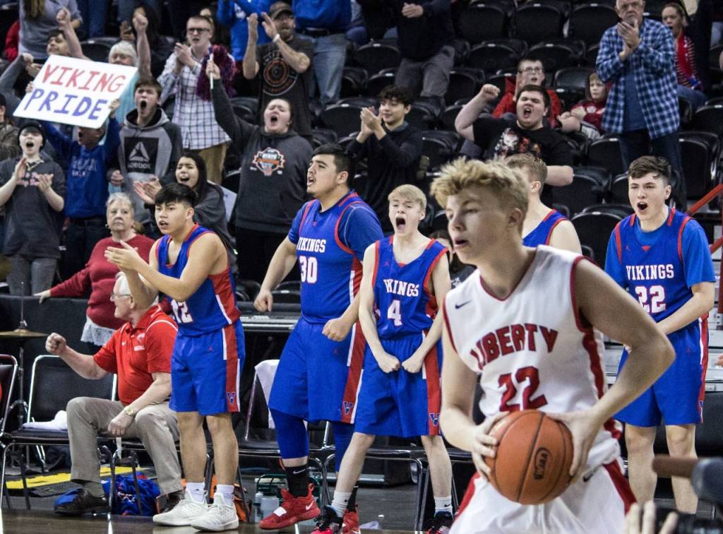 The Willapa Valley bench cheers during the Vikings 71-62 win over top-ranked Liberty (Spangle) in the 2B State Tournament on Thursday in Spokane. (Brandon Hansen | Chewelah Independent)