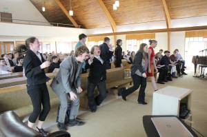 Photos by Michael Lang | Grays Harbor News Group                                Team Ivy celebrates taking the top prize Friday during the conclusion of Business Week at the Montesano Church of God. In this annual team competition, sponsored by Kelsey Foundation, juniors in the Montesano School District learn about how to run a business and develop and market products.