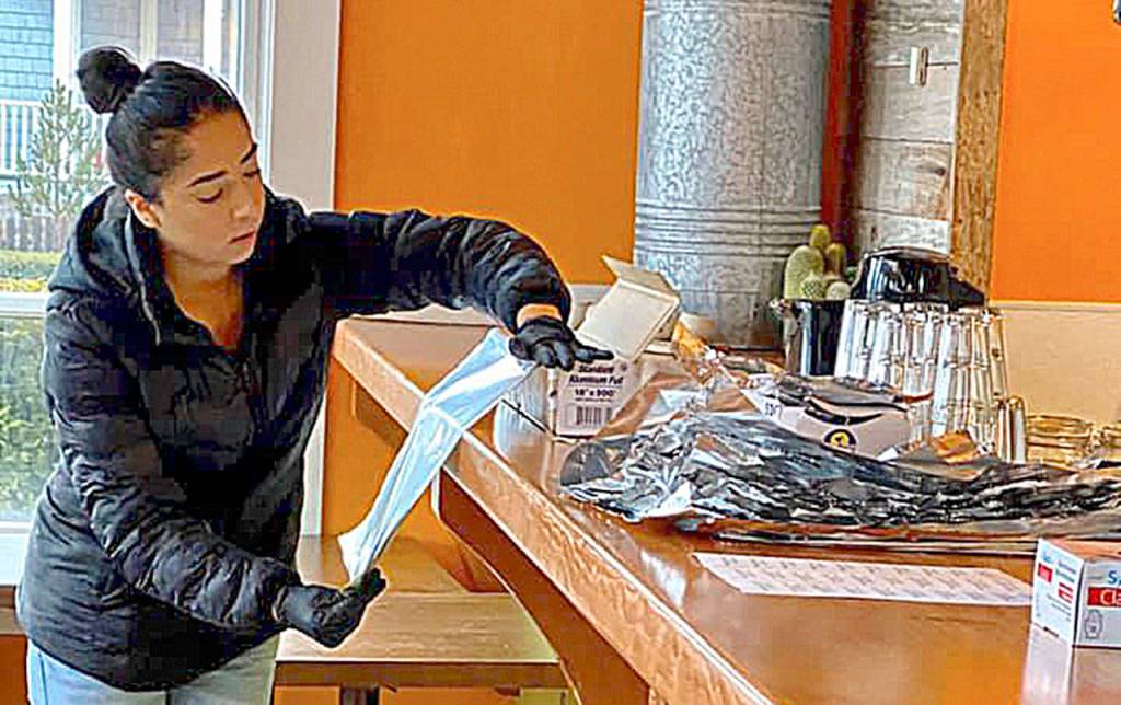 COURTESY PHOTO                                 The 1,000 burritos made at Kokos Mexican Restaurant in Seabrook Saturday were delivered to families in the North Beach School District.