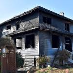 DAN HAMMOCK | GRAYS HARBOR NEWS GROUP                                 One person suffered burns from a house fire on West Fifth Street in Aberdeen Saturday night. The two-story structure is likely a total loss.