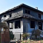 DAN HAMMOCK | GRAYS HARBOR NEWS GROUP                                 One person suffered burns from a house fire on West Fifth Street in Aberdeen Saturday night. The two-story structure is likely a total loss.