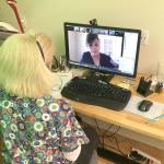 Courtesy photo                                Faculty member Kim Cristobal, left, works online with second-year nursing student Christine Robledo.