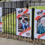 DAN HAMMOCK | GRAYS HARBOR NEWS GROUP                                 The 123 graduating Hoquiam High School seniors are honored with banners, paid for by an anonymous local donor. Monday volunteers were handing out the banners and seniors were able to pose for photos at Art Pocklington Central Play Park.