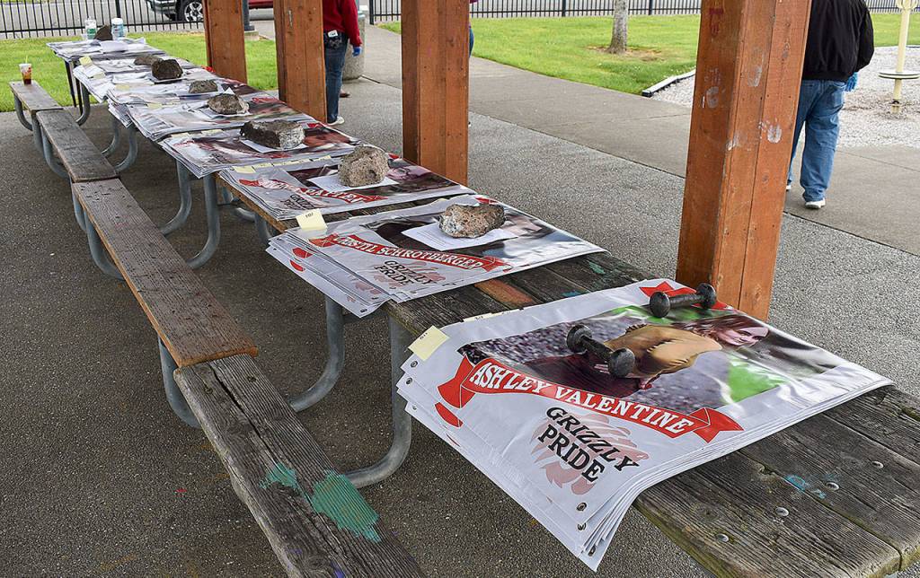 DAN HAMMOCK | GRAYS HARBOR NEWS GROUP                                 An anonymous donor paid for 123 banners honoring Hoquiam High Schools Class of 2020. Seniors practiced social distancing and posed for photos with their banners at Art Pocklington Central Play Park Monday.