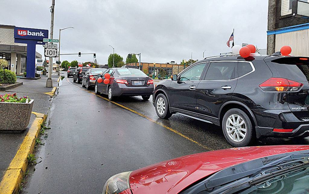 COURTESY PHOTO                                 About 25 people paraded through Aberdeen, Hoquiam and Montesano May 2 to thank COVID-19 frontline and essential workers.