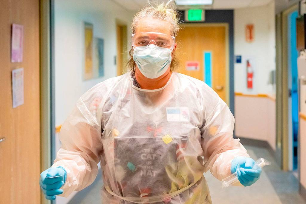 Nurse Crystal Karnas rushes through the halls at GHCH.