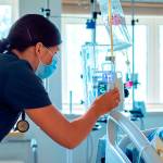 Photos by Christopher Majors Grays Harbor Community Hospital nurse Morgan Watters checks a patients IV.