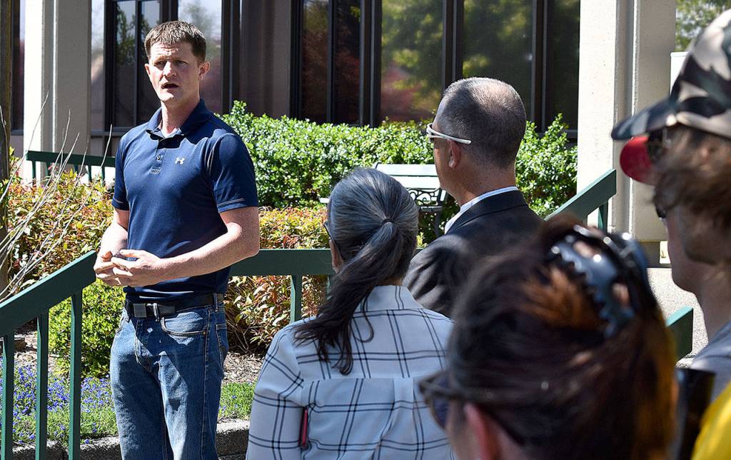 DAN HAMMOCK | GRAYS HARBOR NEWS GROUP                                 About 25 people attended a rally urging the reopening of Grays Harbor County businesses. The event, organized by Citizens of Grays Harbor and Beyond, was held at the county administration building in Montesano Friday. Speaking here is Cathlamet Republican Joel McEntire, who is challenging incumbent Rep. Brian Blake, D-Aberdeen, in the 19th District.