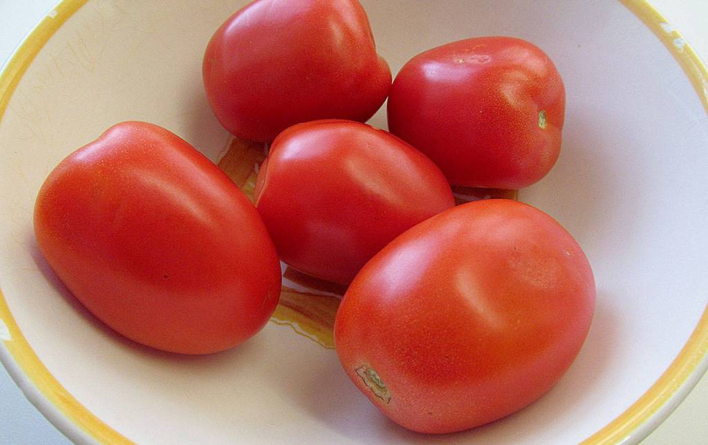 John Phelan photo                                Plum tomatoes can be grown as container plants. This meaty variety is generally used to make tomato sauce and paste.