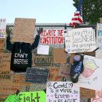 Meant to keep them out, protesters decorate fences around White House with racial justice messages