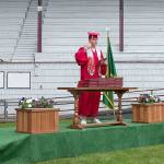 PAMELA PELAN PHOTOGRAPHY                                 Hoquiam High School senior Kyle Larsen picks up his diploma at Olympic Stadium on Monday.