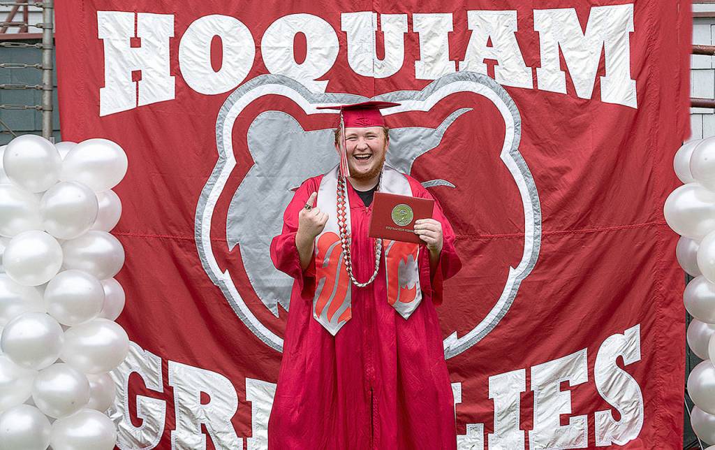 PAMELA PELAN PHOTOGRAPHY                                 Hoquiam High School Class of 2020s Donald Boger picked up his diploma at Olympic Stadium on Monday.