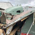 COURTESY GRAYS HARBOR FIRE DISTRICT 5                                 A semi rig forced off State Route 12 in Malone Friday afternoon damaged two homes and a residential travel trailer.