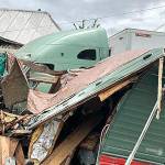 COURTESY GRAYS HARBOR FIRE DISTRICT 5                                 A semi rig forced off State Route 12 in Malone Friday afternoon damaged two homes and a residential travel trailer.