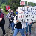 Stephanie Serrano photo                                 Karen Tully, front, participates in a recent march to end systemic racism and violence.