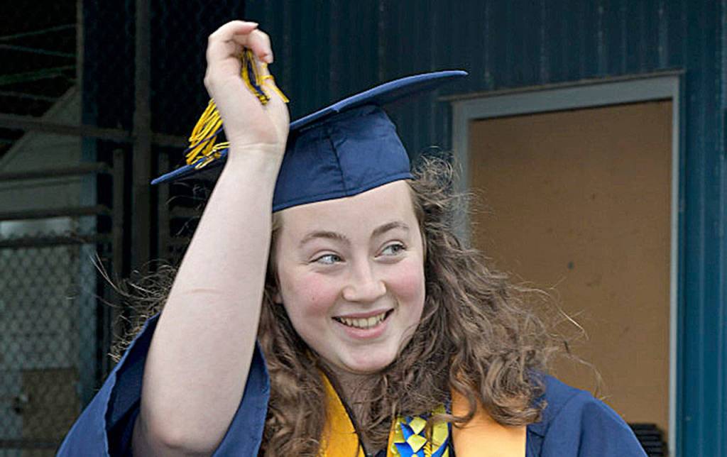 DARRELL WESTMORELAND PHOTO                                 Aberdeen High School senior Allison Patterson moves her tassel to the left after her graduation ceremony at Stewart Field June 12.