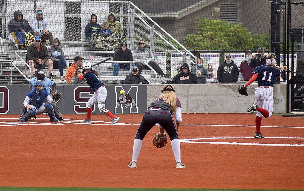DAN HAMMOCK | GRAYS HARBOR NEWS GROUP                                 Pe Ell-Willapa Valley pitcher Katie Adkins hurls one toward home plate against teammate Katelyn McGough.