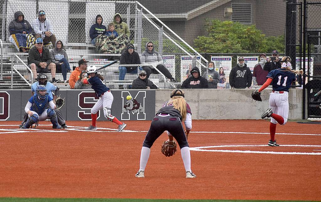 DAN HAMMOCK | GRAYS HARBOR NEWS GROUP                                 Pe Ell-Willapa Valley pitcher Katie Adkins hurls one toward home plate against teammate Katelyn McGough.