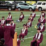 DAN HAMMOCK | GRAYS HARBOR NEWS GROUP                                 Cole Daniels and Braden Dohrmann deliver the valedictorian address at the Montesano High School graduation ceremony at Jack Rottle Field Saturday.