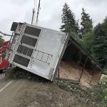 WSDOT PHOTO                                 Crews remove a chip truck that crashed on eastbound Highway 12 at Baila Dip just east of Aberdeen.