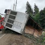WSDOT PHOTO                                 Crews remove a chip truck that crashed on eastbound Highway 12 at Baila Dip just east of Aberdeen.